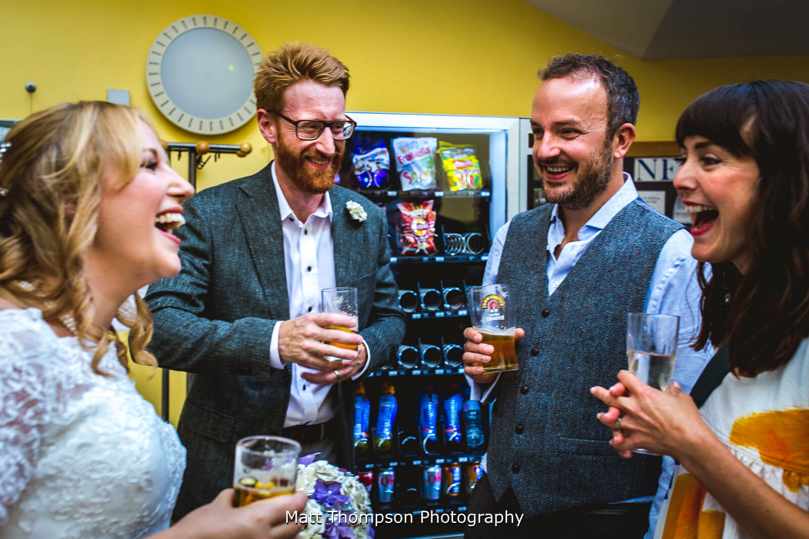 groom talking to wedding guests
