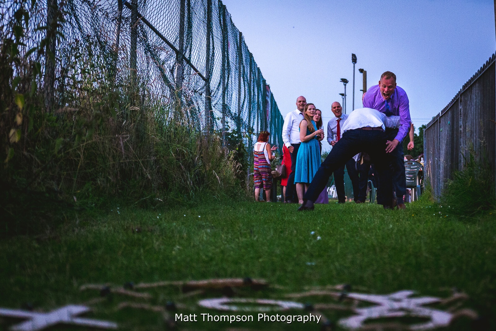 wedding guests wrestling