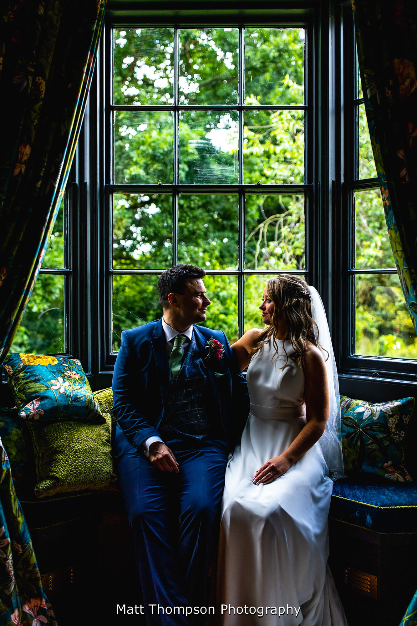 bride and groom sitting