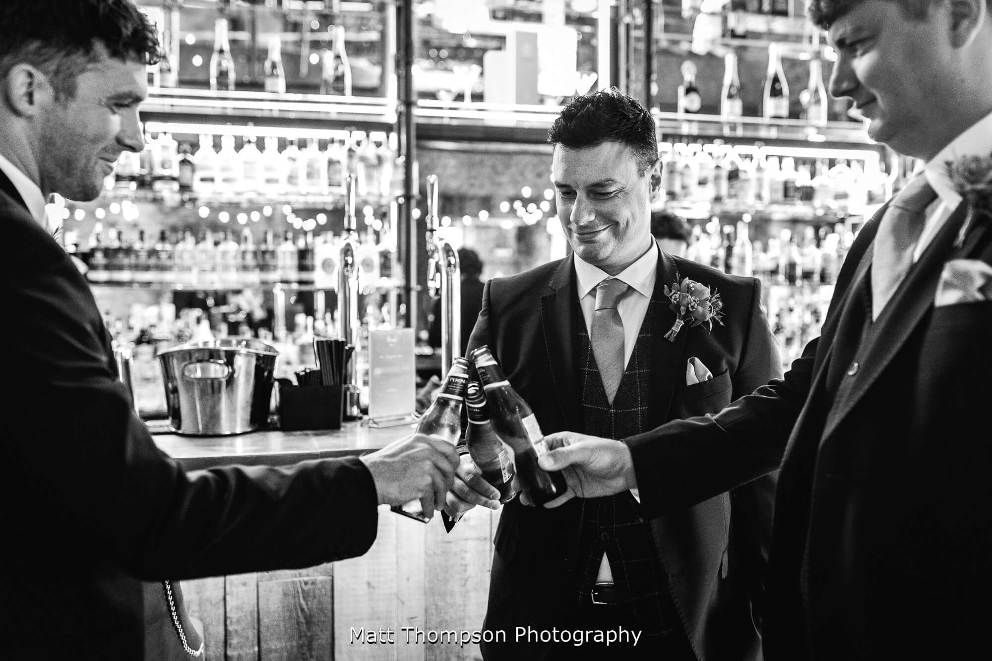 grooms men cheering