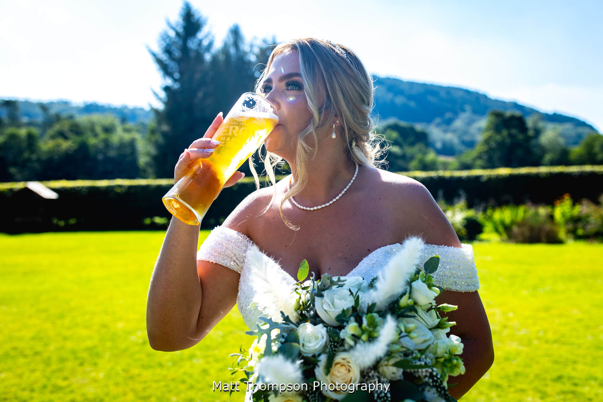 bride drinking pint