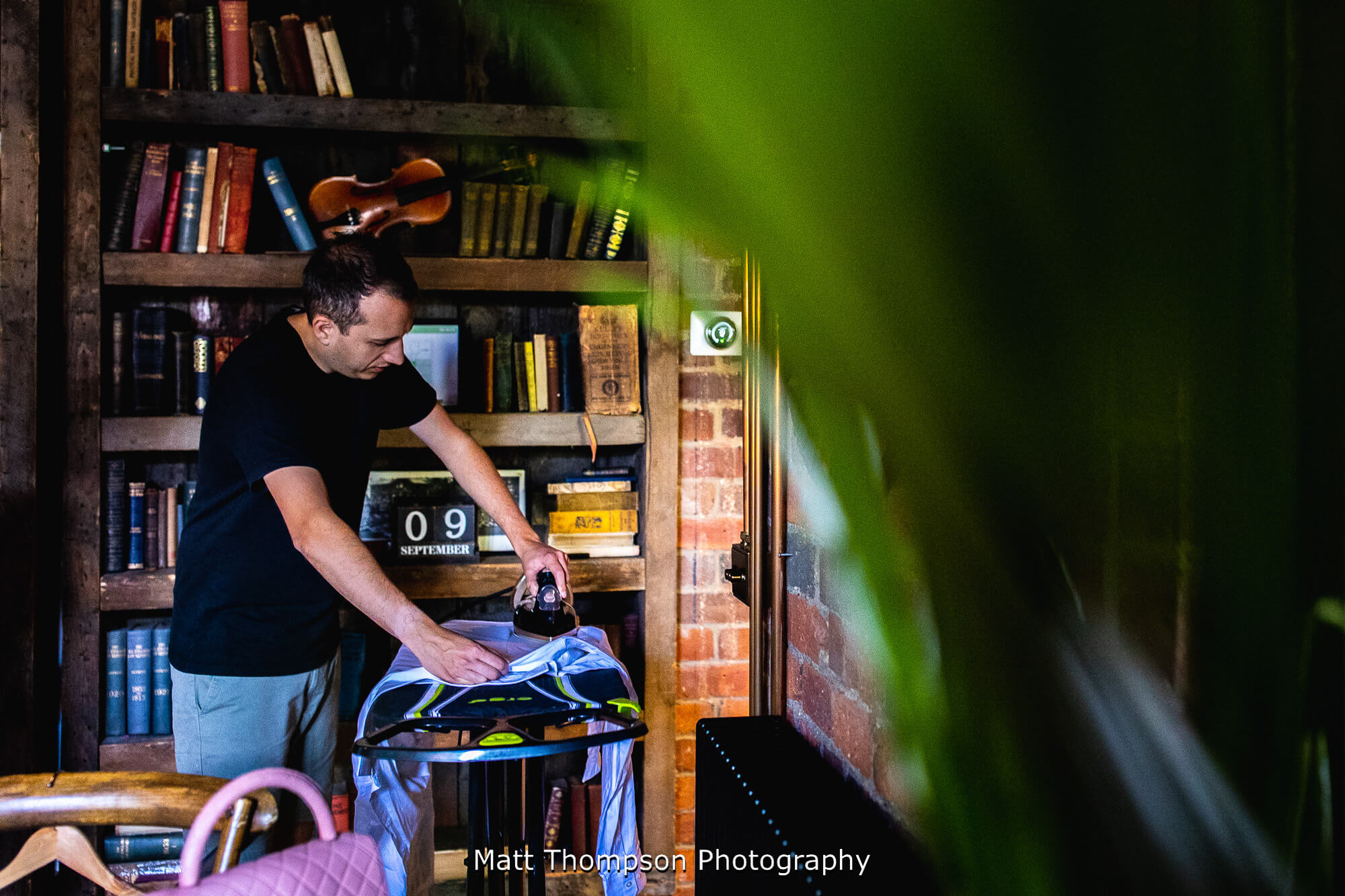 groom ironing