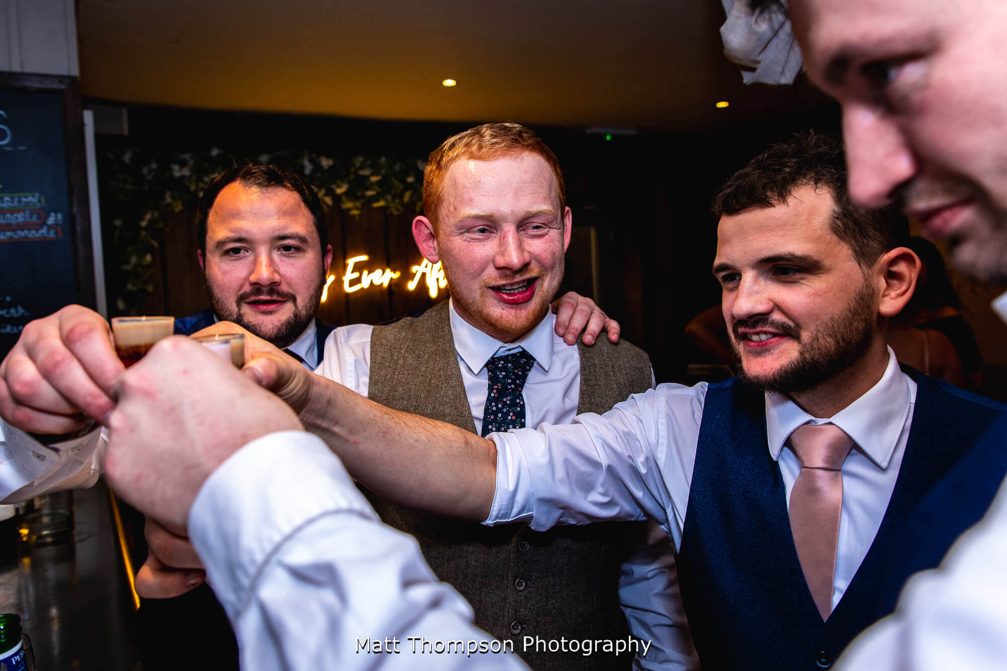 groom doing shots