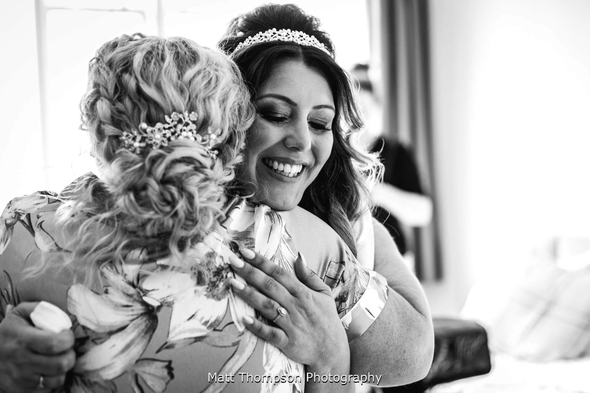 bride hugging