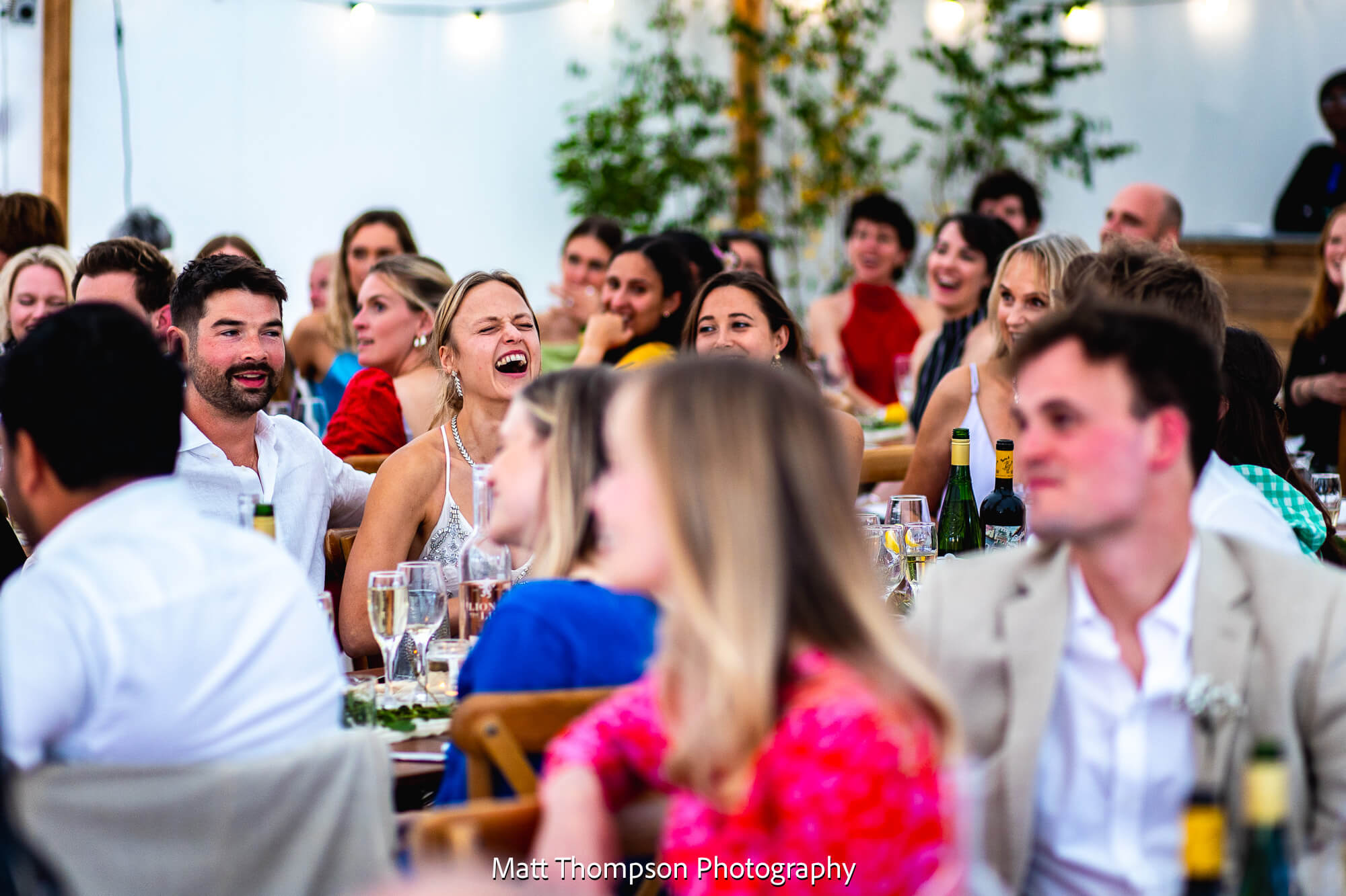 bride and groom laughing