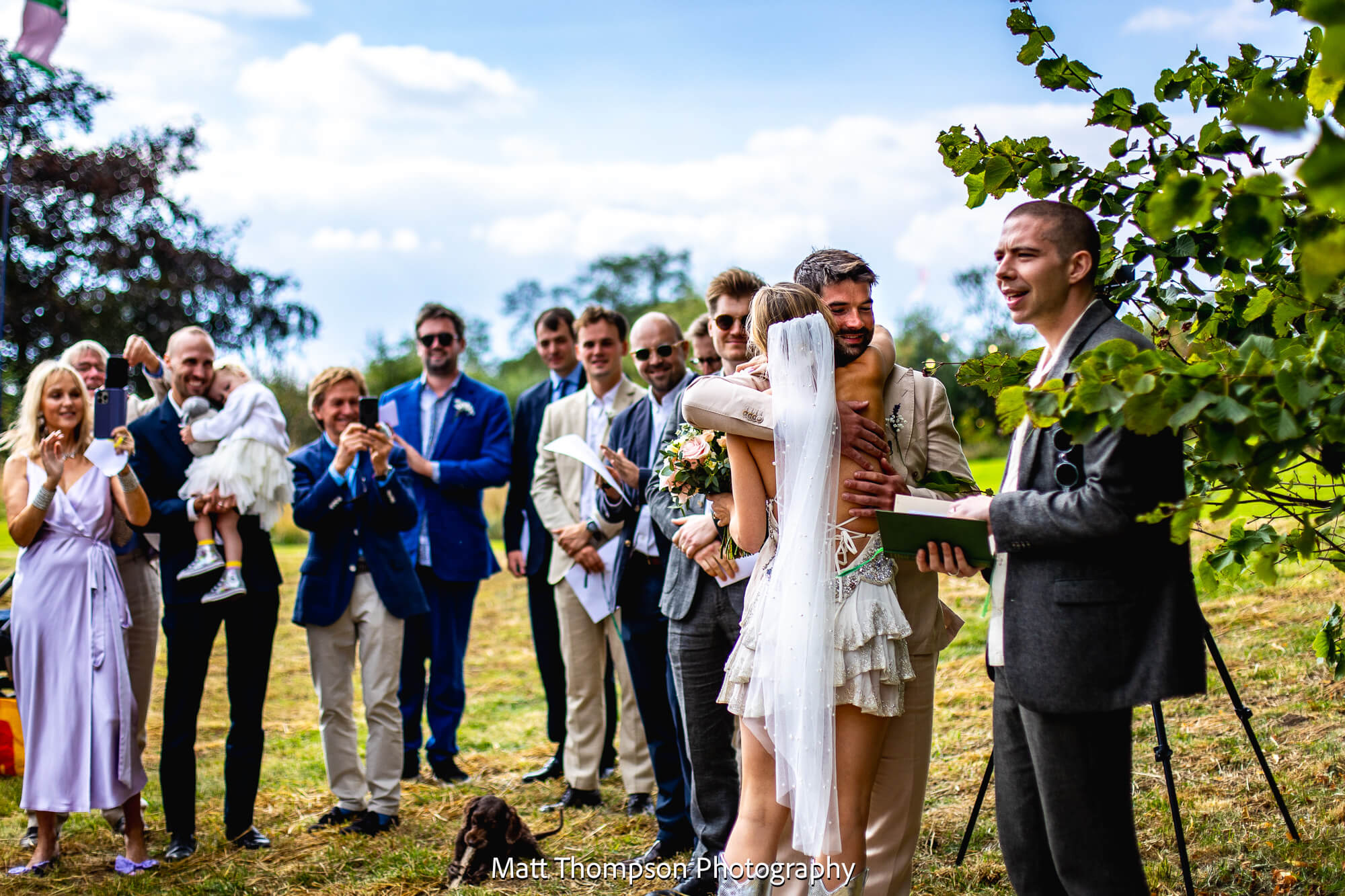 bride and groom hugging