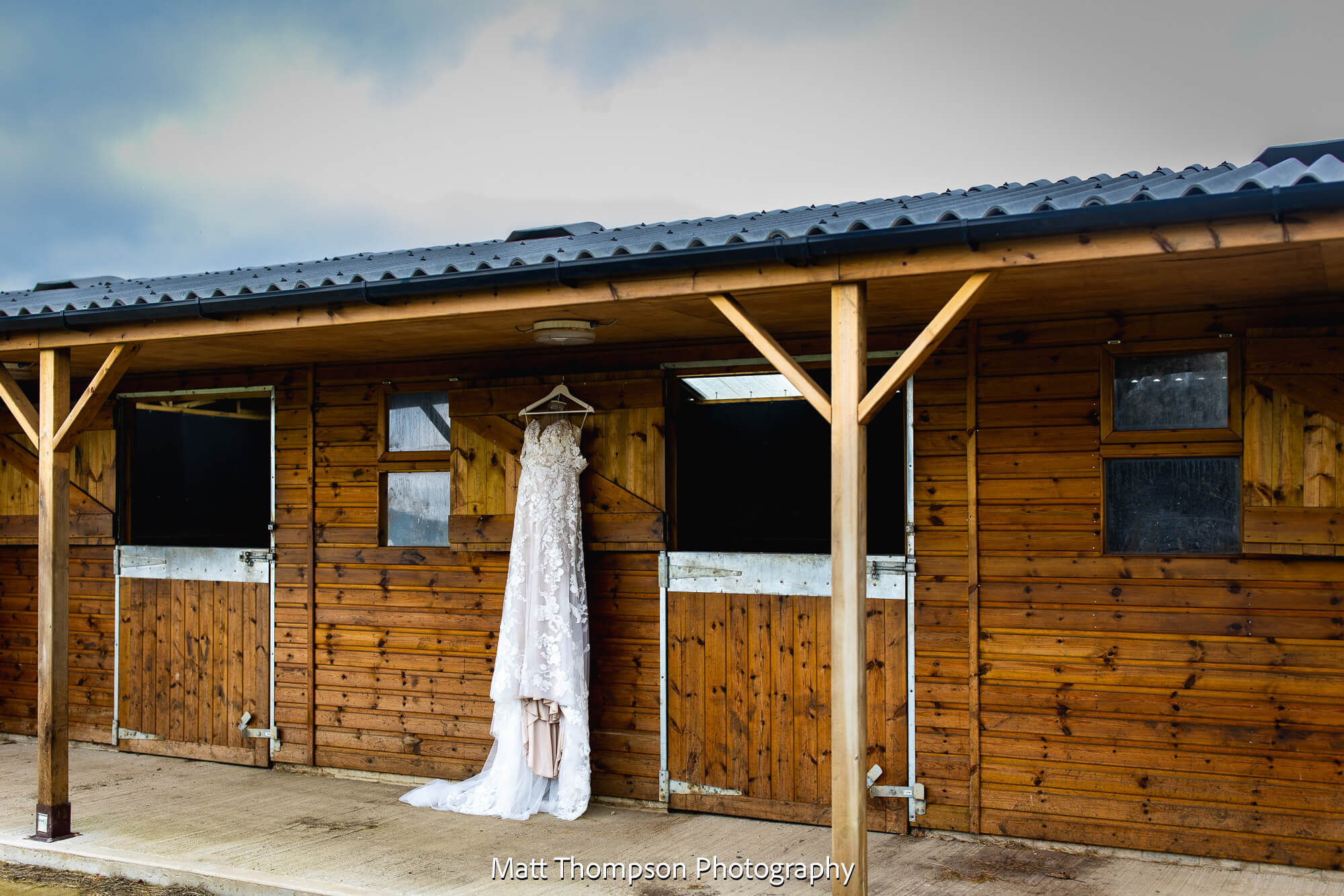 wedding dress in a barn