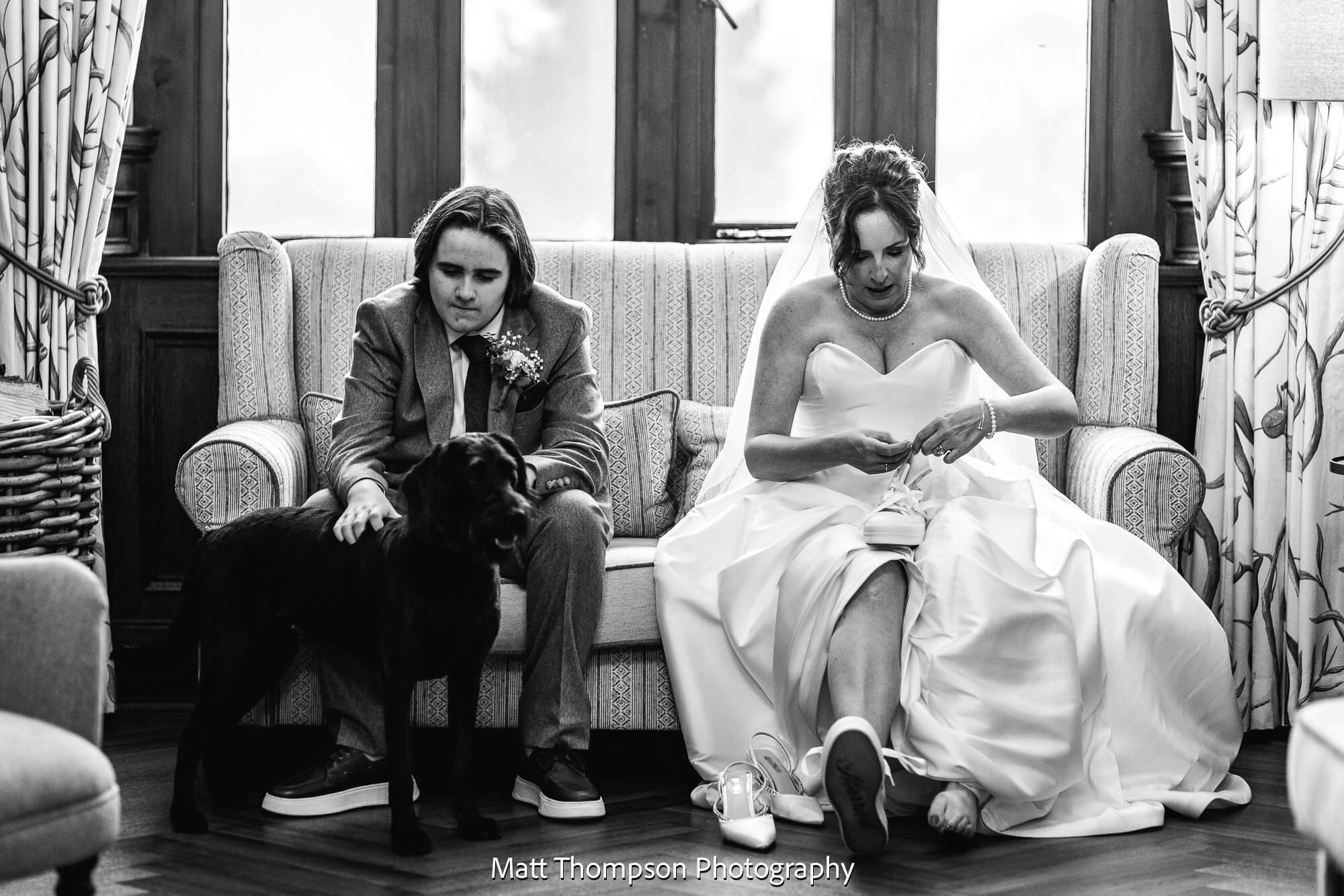 bride putting on shoes