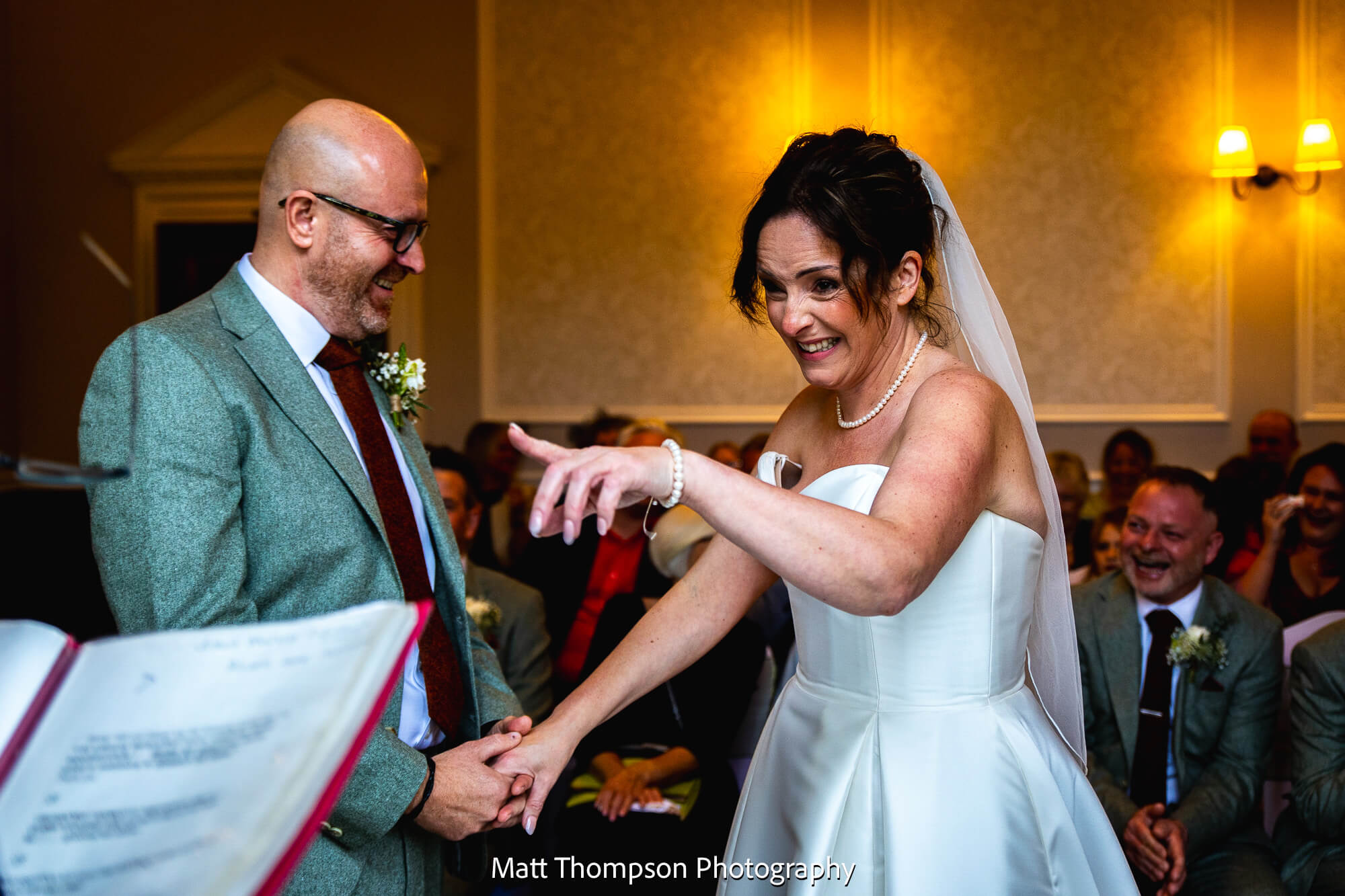 bride and groom laughing