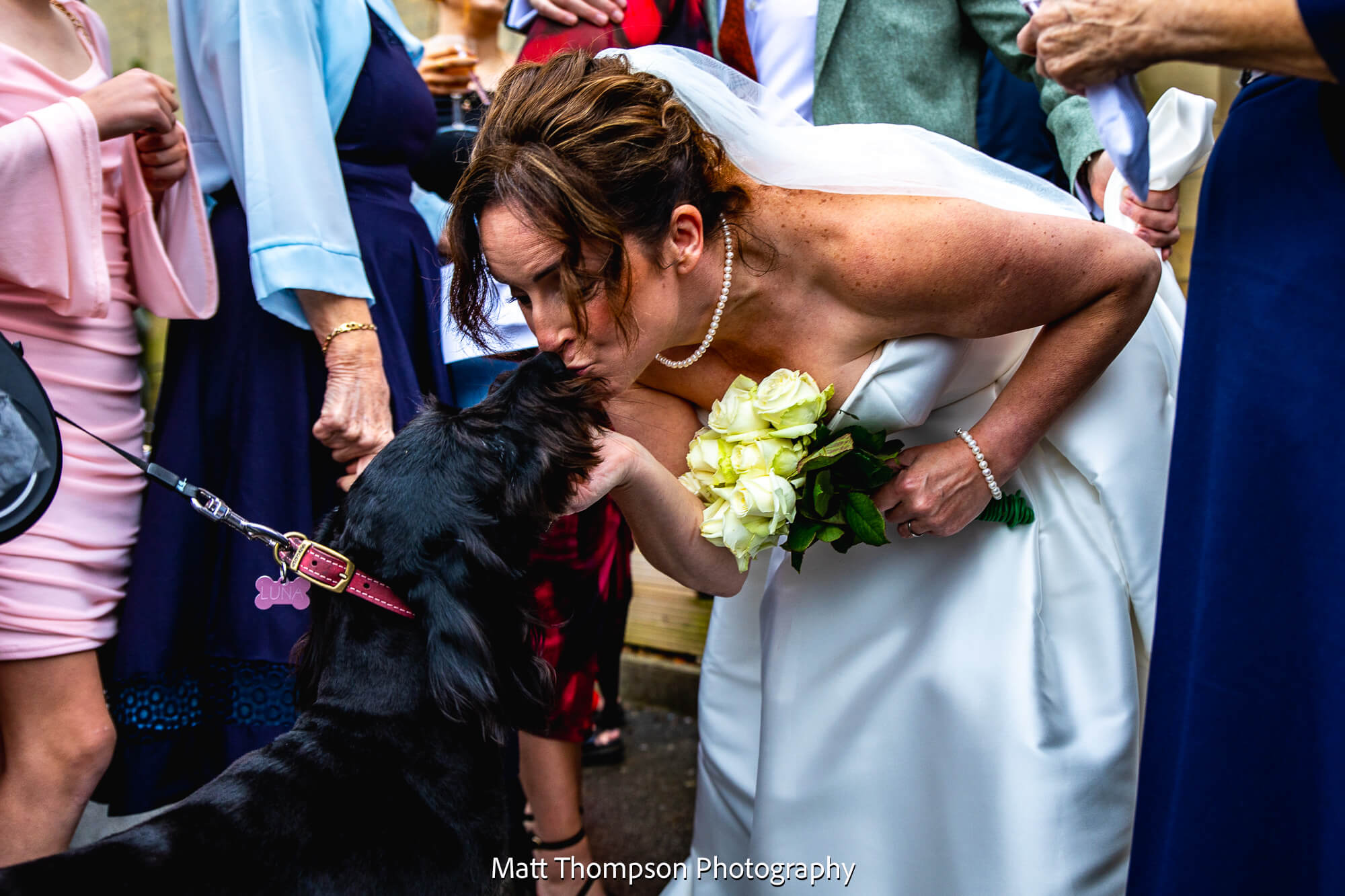 bride with her dog