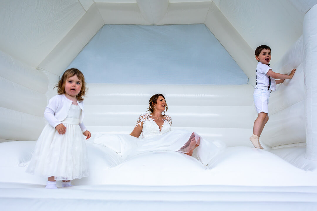 Bride on a bouncy castle